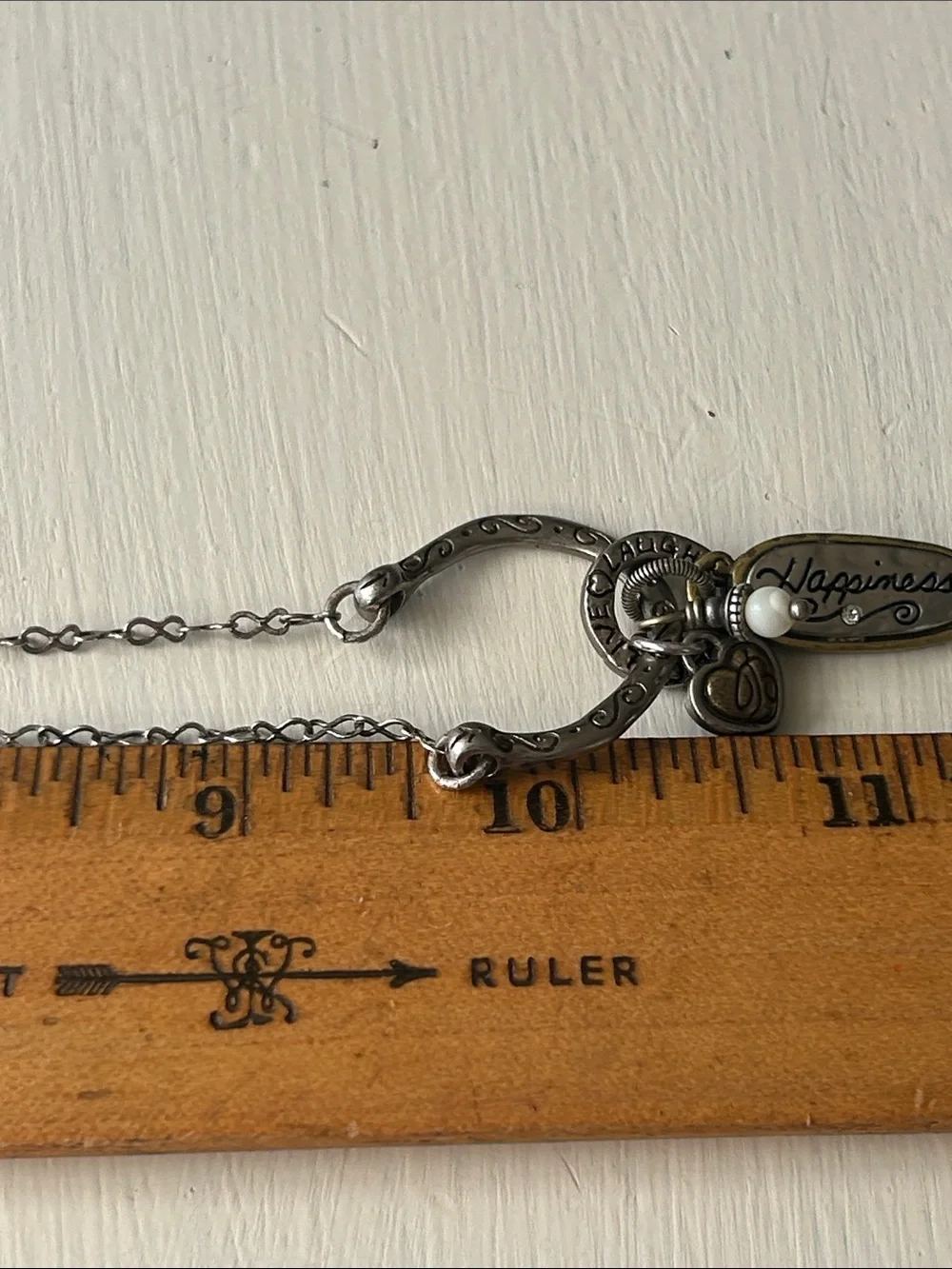 Brighton Art & Soul necklace featuring mixed-metal horseshoe pendant/charms.
